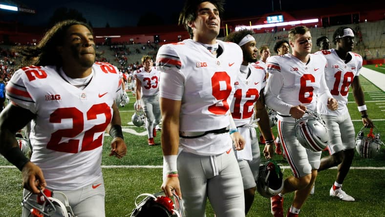 Ohio State Buckeyes quarterback Jack Miller III (9) runs off the field following the Buckeyes' 52-13 victory against the Rutgers Scarlet Knights in a NCAA Division I football game on Saturday, Oct. 2, 2021 at SHI Stadium in Piscataway, New Jersey.

Cfb Ohio State Buckeyes At Rutgers Scarlet Knights