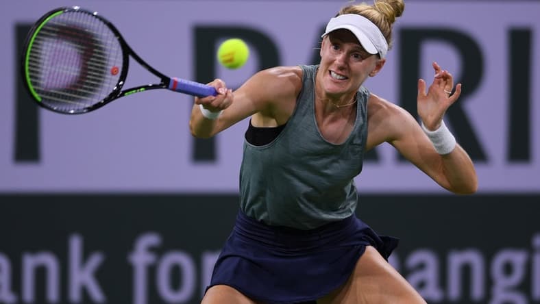 Oct 9, 2021; Indian Wells, CA, USA; Alison Riske (USA) hits a shot against Bianca Andreescu (CAN) at Indian Wells Tennis Garden. Mandatory Credit: Orlando Ramirez-USA TODAY Sports