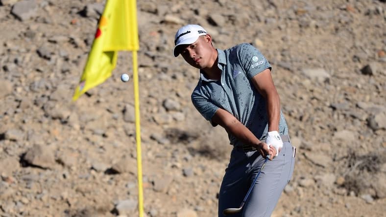 Oct 14, 2021; Las Vegas, Nevada, USA; Collin Morikawa chips on the second fringe during the first round of the CJ Cup golf tournament. Mandatory Credit: Joe Camporeale-USA TODAY Sports