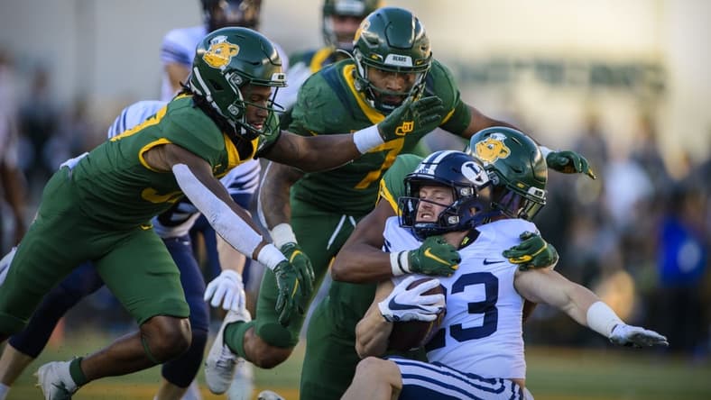 Oct 16, 2021; Waco, Texas, USA; Brigham Young Cougars wide receiver Hobbs Nyberg (23) is brought down by the Baylor Bears defense during the second half at McLane Stadium. Mandatory Credit: Jerome Miron-USA TODAY Sports