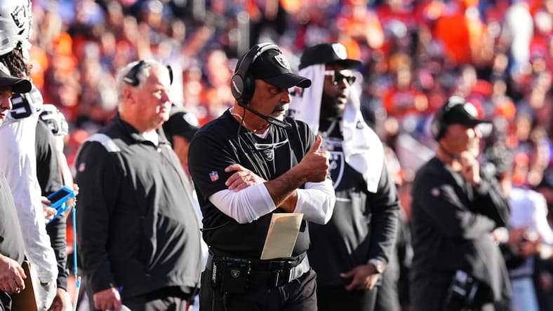 Oct 17, 2021; Denver, Colorado, USA; Las Vegas Raiders interim head coach Rich Bisaccia reacts to a play in the second half against the Denver Broncos at Empower Field at Mile High. Mandatory Credit: Ron Chenoy-USA TODAY Sports