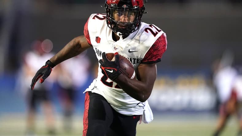 Oct 15, 2021; San Jose, California, USA; San Diego State Aztecs running back Greg Bell (22) warms up before the game against the San Jose State Spartans at CEFCU Stadium. Mandatory Credit: Darren Yamashita-USA TODAY Sports