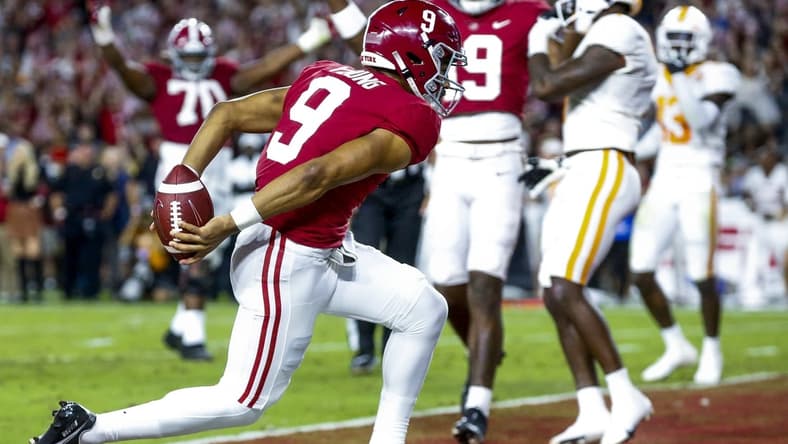 Oct 23, 2021; Tuscaloosa, Alabama, USA; Alabama Crimson Tide quarterback Bryce Young (9) crosses the goal line to score a touchdown against the Tennessee Volunteers during the first half at Bryant-Denny Stadium. Mandatory Credit: Gary Cosby Jr.-USA TODAY Sports