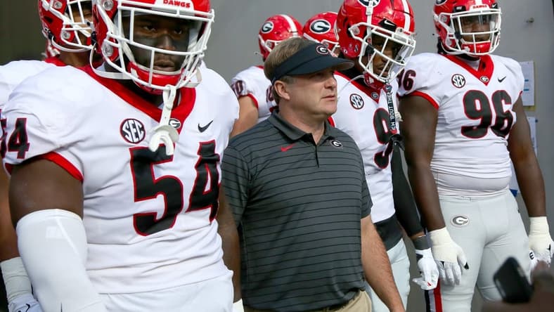 Georgia Bulldogs head coach Kirby Smart walks out of the tunnel with his team at the start of the annual Florida Georgia rivalry game at TIAA Bank Field in Jacksonville Fla. October 30, 2021.
Flagi 103021 Florida Georgia Fb 37