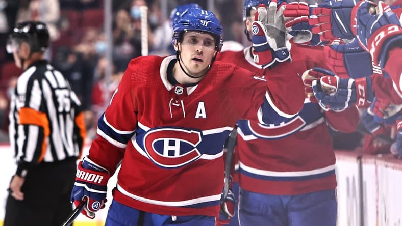 Nov 2, 2021; Montreal, Quebec, CAN; Montreal Canadiens right wing Brendan Gallagher (11) celebrates his goal against Detroit Red Wings with teammates during the third period at Bell Centre. Mandatory Credit: Jean-Yves Ahern-USA TODAY Sports