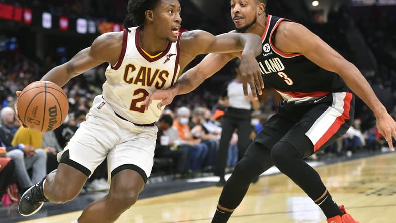 Nov 3, 2021; Cleveland, Ohio, USA; Portland Trail Blazers guard CJ McCollum (3) defends Cleveland Cavaliers guard Collin Sexton (2) in the third quarter at Rocket Mortgage FieldHouse. Mandatory Credit: David Richard-USA TODAY Sports