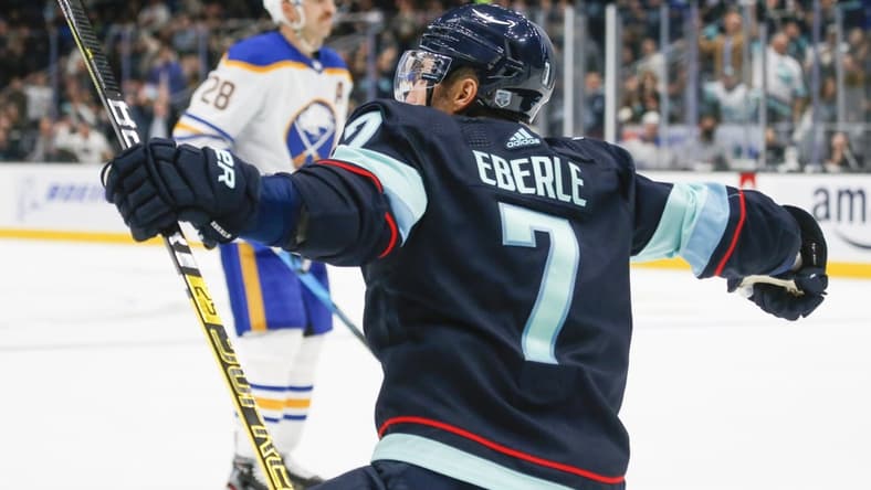 Nov 4, 2021; Seattle, Washington, USA; Seattle Kraken right wing Jordan Eberle (7) celebrates after scoring a goal against the Buffalo Sabres during the second period at Climate Pledge Arena. Mandatory Credit: Joe Nicholson-USA TODAY Sports