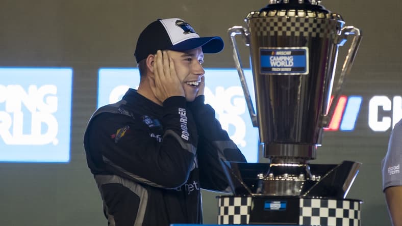 Nov 5, 2021; Avondale, AZ, USA; Camping World Truck Series driver Ben Rhodes celebrates after clinching the 2021 Truck Series championship following the Lucus Oil 150 Championship race at Phoenix Raceway. Mandatory Credit: Mark J. Rebilas-USA TODAY Sports