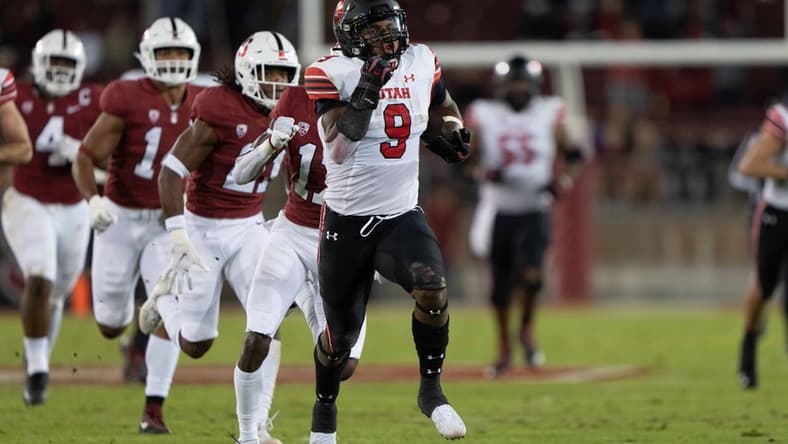 Nov 5, 2021; Stanford, California, USA; Utah Utes running back Tavion Thomas (9) runs with the ball during the second quarter against the Stanford Cardinal at Stanford Stadium. Mandatory Credit: Stan Szeto-USA TODAY Sports