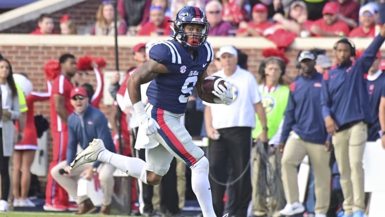 Nov 6, 2021; Oxford, Mississippi, USA; Mississippi Rebels running back Jerrion Ealy (9) runs the ball against the Liberty Flames during a play that would result in a touchdown in the first quarter at Vaught-Hemingway Stadium. Mandatory Credit: Matt Bush-USA TODAY Sports