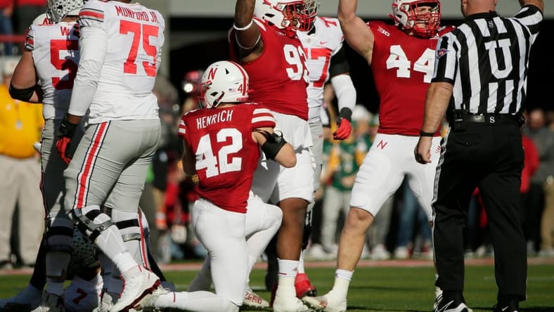 Nebraska Cornhuskers defensive lineman Damion Daniels (93) and Nebraska Cornhuskers linebacker Garrett Nelson (44) celebreate after teammate Nebraska Cornhuskers linebacker Caleb Tannor (2) sacked Ohio State Buckeyes quarterback C.J. Stroud (7) Saturday's NCAA Division I football game at Memorial Stadium in Lincoln, Neb., on November 6, 2021.

Osu21neb Bjp 185
