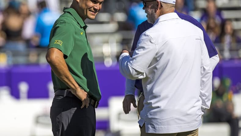 Nov 6, 2021; Fort Worth, Texas, USA;  TCU Horned Frogs interim head coach Jerry Kill chats with Baylor head coach Dave Aranda before the game at Amon G. Carter Stadium. Mandatory Credit: Kevin Jairaj-USA TODAY Sports