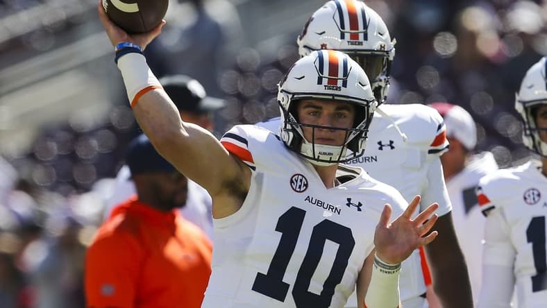 Nov 6, 2021; College Station, Texas, USA;  Auburn Tigers quarterback Bo Nix (10) warms up before playing against the Texas A&M Aggies at Kyle Field. Mandatory Credit: Thomas Shea-USA TODAY Sports