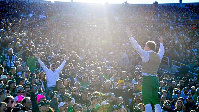 Nov 6, 2021; South Bend, Indiana, USA; The Notre Dame Leprechaun exhorts the crowd in the first quarter of the game between the Notre Dame Fighting Irish and the Navy Midshipmen at Notre Dame Stadium. Mandatory Credit: Matt Cashore-USA TODAY Sports