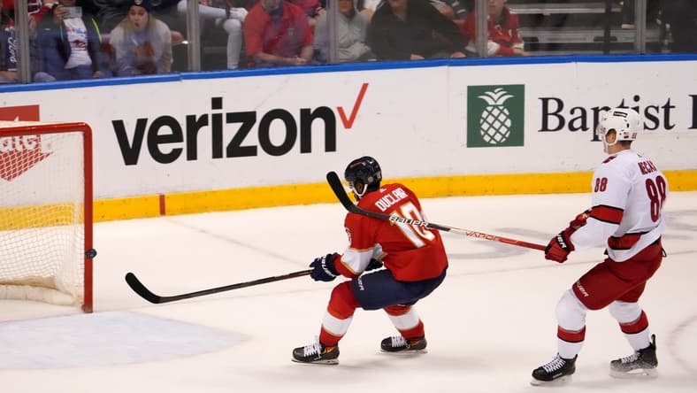 Nov 6, 2021; Sunrise, Florida, USA; Florida Panthers left wing Anthony Duclair (10) scores and empty net goal in front of Carolina Hurricanes center Martin Necas (88) during the third period at FLA Live Arena. Mandatory Credit: Jasen Vinlove-USA TODAY Sports