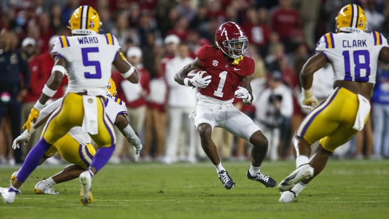 Nov 6, 2021; Tuscaloosa, Alabama, USA;  Alabama Crimson Tide wide receiver Jameson Williams (1) runs the ball against the LSU Tigers at Bryant-Denny Stadium. Mandatory Credit: Gary Cosby Jr.-USA TODAY Sports