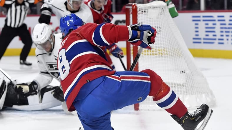 Nov 9, 2021; Montreal, Quebec, CAN; Montreal Canadiens defenseman Ben Chiarot (8) scores a goal against the Los Angeles Kings during the first period at the Bell Centre. Mandatory Credit: Eric Bolte-USA TODAY Sports