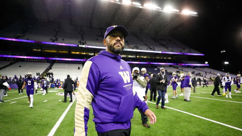 Nov 6, 2021; Seattle, Washington, USA; Washington Huskies head coach Jimmy Lake signals for his players to go to the locker room following a 26-16 loss against the Oregon Ducks at Alaska Airlines Field at Husky Stadium. Mandatory Credit: Joe Nicholson-USA TODAY Sports
