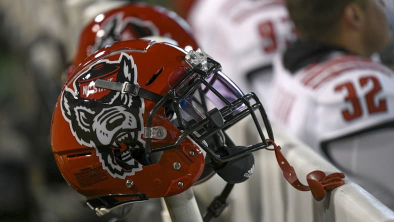 Nov 13, 2021; Winston-Salem, North Carolina, USA; A North Carolina State Wolfpack helmet seen on the sideline during the second half against the Wake Forest Demon Deacons at Truist Field. Mandatory Credit: William Howard-USA TODAY Sports