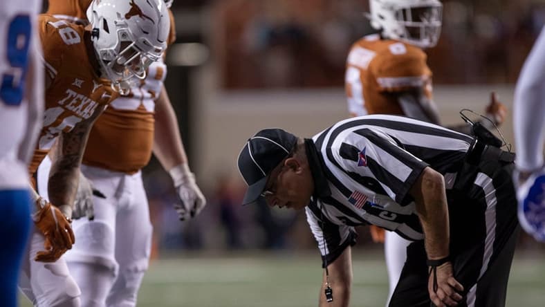 A referee checks on Texas running back Bijan Robinson (5) after an injury during the game against the Kansas Jayhawks on Saturday, Nov. 13, 2021.
Mlc Ut V Kansas 1594