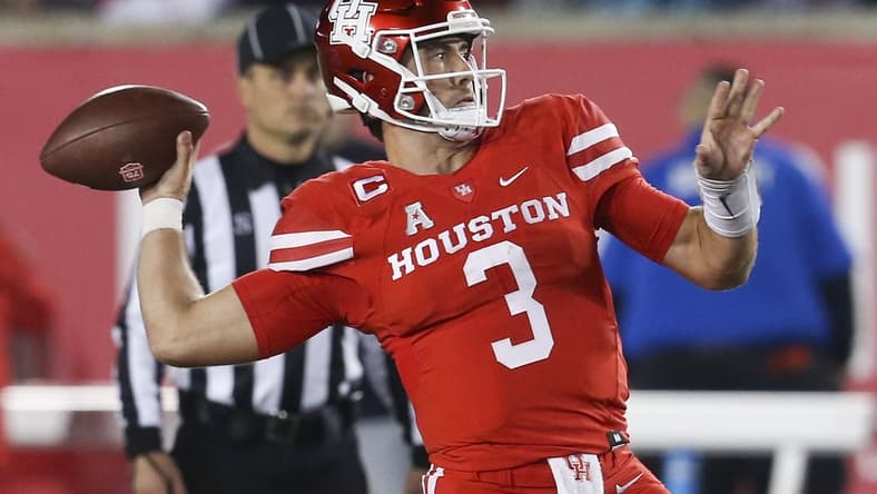 Nov 19, 2021; Houston, Texas, USA; Houston Cougars quarterback Clayton Tune (3) drops back to pass against the Memphis Tigers in the fourth quarter at TDECU Stadium. Houston Cougars won 31 to 13. Mandatory Credit: Thomas Shea-USA TODAY Sports