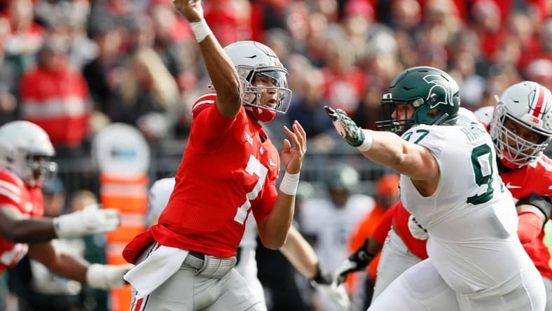 Ohio State Buckeyes quarterback C.J. Stroud (7) throws over Michigan State Spartans defensive tackle Maverick Hansen (97) during the first quarter of the NCAA football game at Ohio Stadium in Columbus on Saturday, Nov. 20, 2021.

Michigan State Spartans At Ohio State Buckeyes Football