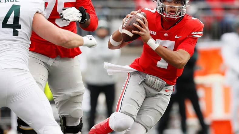 Ohio State Buckeyes quarterback C.J. Stroud (7) scrambles out of the pocket during the third quarter of the NCAA football game against the Michigan State Spartans at Ohio Stadium in Columbus on Saturday, Nov. 20, 2021.

Michigan State Spartans At Ohio State Buckeyes Football