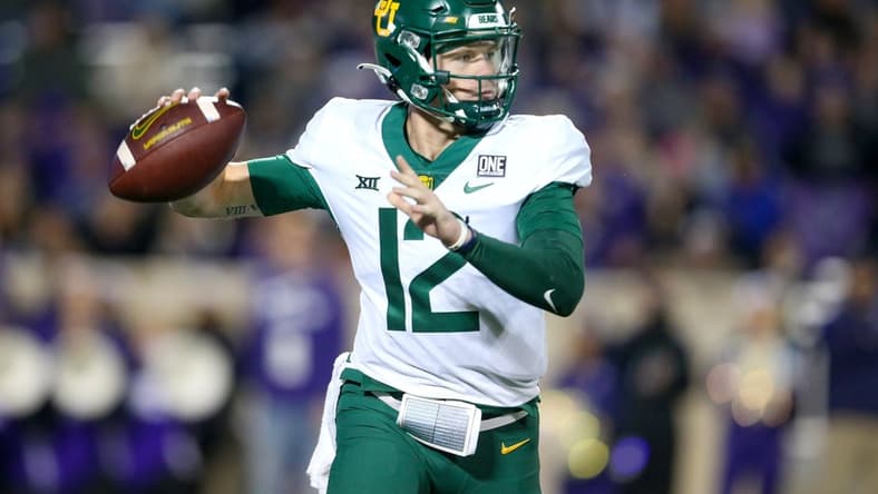 Nov 20, 2021; Manhattan, Kansas, USA; Baylor Bears quarterback Blake Shapen (12) passes the ball during the third quarter against the Kansas State Wildcats at Bill Snyder Family Football Stadium. Mandatory Credit: Scott Sewell-USA TODAY Sports