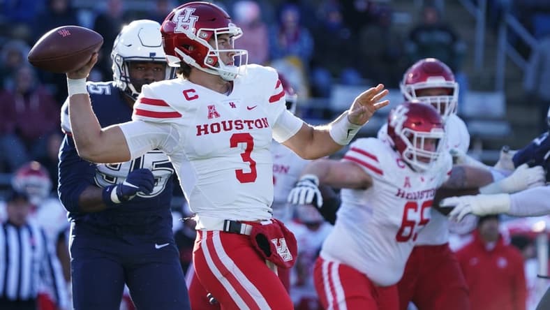 Nov 27, 2021; East Hartford, Connecticut, USA; Houston Cougars quarterback Clayton Tune (3) throws a pass against the Connecticut Huskies in the second quarter at Rentschler Field at Pratt & Whitney Stadium. Mandatory Credit: David Butler II-USA TODAY Sports
