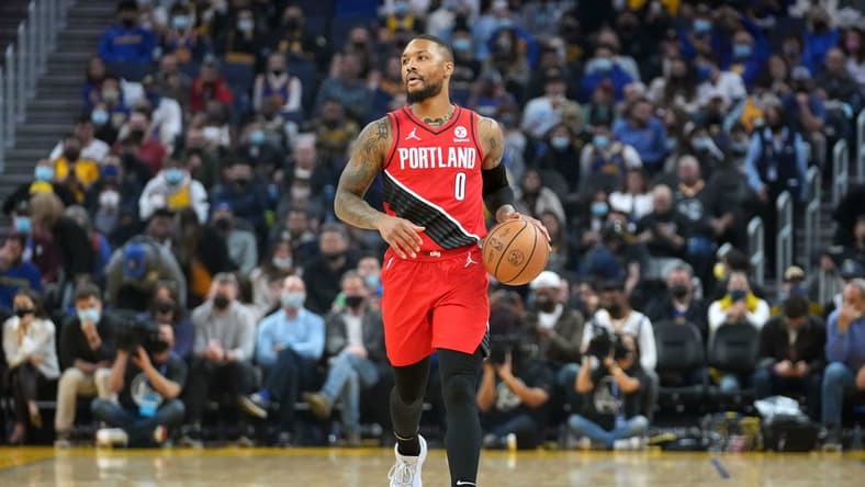 Nov 26, 2021; San Francisco, California, USA; Portland Trail Blazers guard Damian Lillard (0) dribbles during the first quarter against the Golden State Warriors at Chase Center. Mandatory Credit: Darren Yamashita-USA TODAY Sports