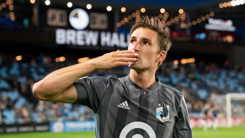 Jul 27, 2019; Saint Paul, MN, USA; Minnesota United forward Ethan Finlay (13) salutes the fans after the game against Vancouver Whitecaps at Allianz Field. Mandatory Credit: Brad Rempel-USA TODAY Sports