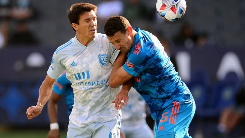 May 29, 2021; Carson, California, USA; San Jose Earthquakes midfielder Shea Salinas (6) plays for the ball against Los Angeles Galaxy defender Daniel Steres (5) during the second half at Dignity Health Sports Park. Mandatory Credit: Gary A. Vasquez-USA TODAY Sports