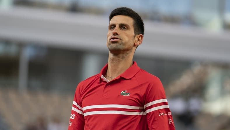 Jun 11, 2021; Paris, France; Novak Djokovic (SRB) reacts during his semifinal match against Rafael Nadal (ESP) on day 13 of the French Open at Stade Roland Garros. Mandatory Credit: Susan Mullane-USA TODAY Sports