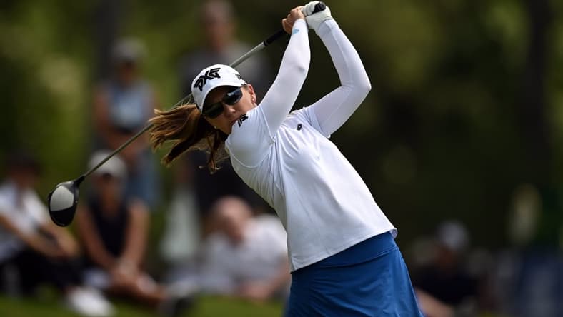 Jun 24, 2021; John's Creek, Georgia, USA; Austin Ernst plays her shot from the 18th tee during the first round of the KPMG Women's PGA Championship golf tournament at the Atlanta Athletic Club. Mandatory Credit: Adam Hagy-USA TODAY Sports
