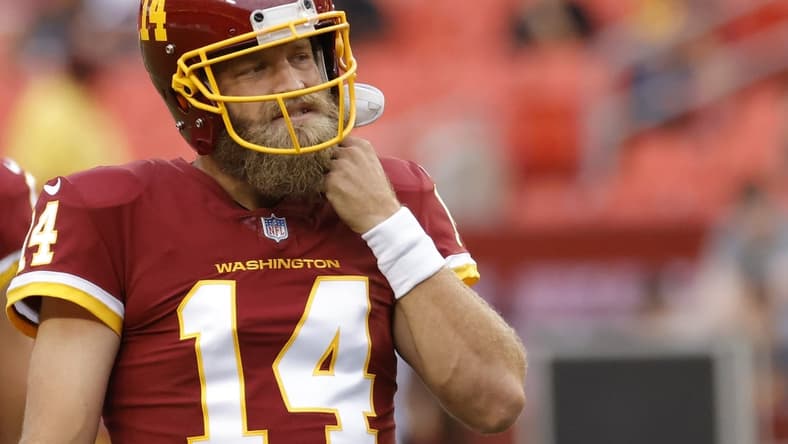 Aug 20, 2021; Landover, Maryland, USA; Washington Football Team quarterback Ryan Fitzpatrick (14) stands on the field prior to the Washington Football Team's game against the Cincinnati Bengals at FedExField. Mandatory Credit: Geoff Burke-USA TODAY Sports