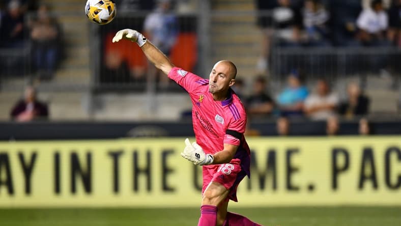 Sep 3, 2021; Philadelphia, Pennsylvania, USA; New England Revolution keeper Brad Knighton (18) passes the ball in the second half against the Philadelphia Union at Subaru Park. Mandatory Credit: Kyle Ross-USA TODAY Sports