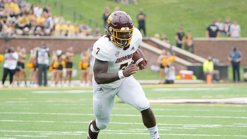 Sep 4, 2021; Columbia, Missouri, USA; Central Michigan Chippewas running back Lew Nichols III (7) runs the ball against the Missouri Tigers during the first half at Faurot Field at Memorial Stadium. Mandatory Credit: Denny Medley-USA TODAY Sports