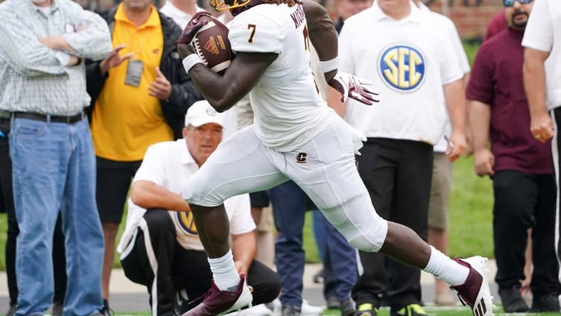 Sep 4, 2021; Columbia, Missouri, USA; Central Michigan Chippewas running back Lew Nichols III (7) runs the ball against the Missouri Tigers during the game at Faurot Field at Memorial Stadium. Mandatory Credit: Denny Medley-USA TODAY Sports