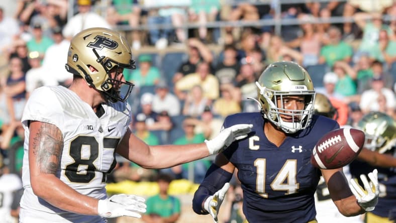 Notre Dame safety Kyle Hamilton (14) intercepts a pass intended for Purdue tight end Payne Durham (87) in the end zone during the fourth quarter of an NCAA football game, Saturday, Sept. 18, 2021 at Notre Dame Stadium in South Bend.

Cfb Notre Dame Vs Purdue