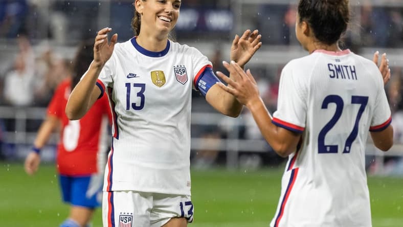 Sep 21, 2021; Cincinnati, Ohio, USA; United States forward Alex Morgan (13) celebrates forward Sophia Smith (27) after scoring her second goal against Paraguay with during an international friendly soccer match at TQL Stadium. Mandatory Credit: Trevor Ruszkowski-USA TODAY Sports