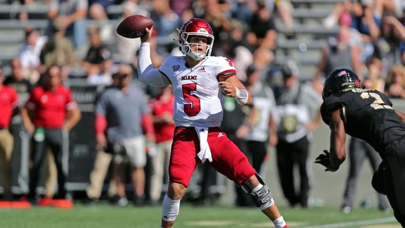 Sep 25, 2021; West Point, New York, USA; Miami (Ohio) RedHawks quarterback Brett Gabbert (5) throws a pass against the Army Black Knights during the second half at Michie Stadium. Mandatory Credit: Danny Wild-USA TODAY Sports