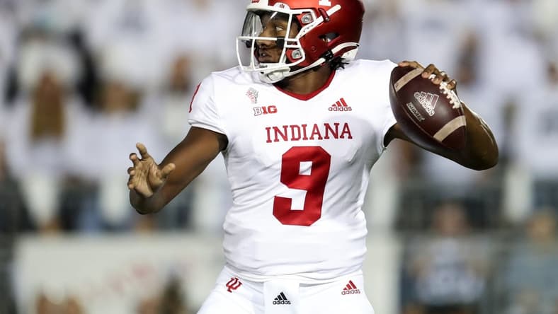Oct 2, 2021; University Park, Pennsylvania, USA; Indiana Hoosiers quarterback Michael Penix Jr. (9) drops back to throw a pass against the Penn State Nittany Lions during the first quarter at Beaver Stadium. Mandatory Credit: Matthew OHaren-USA TODAY Sports