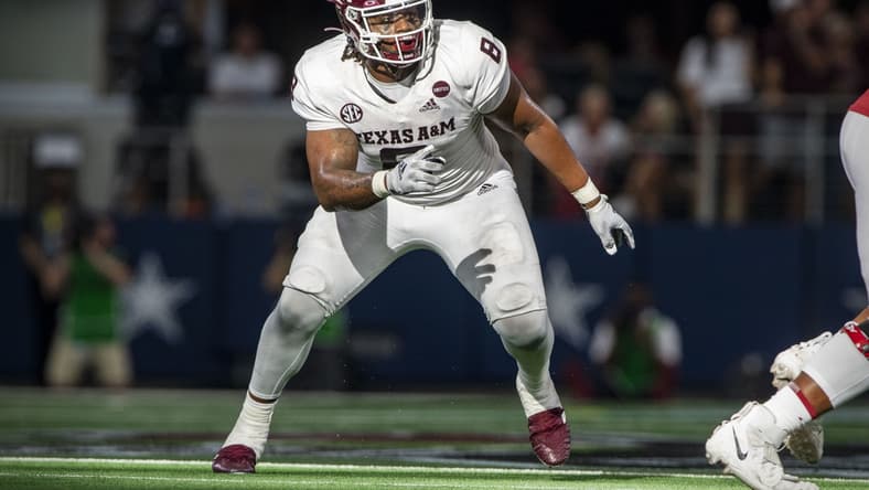 Sep 25, 2021; Arlington, Texas, USA; Texas A&M Aggies defensive lineman DeMarvin Leal (8) in action during the game between the Arkansas Razorbacks and the Texas A&M Aggies at AT&T Stadium. Mandatory Credit: Jerome Miron-USA TODAY Sports