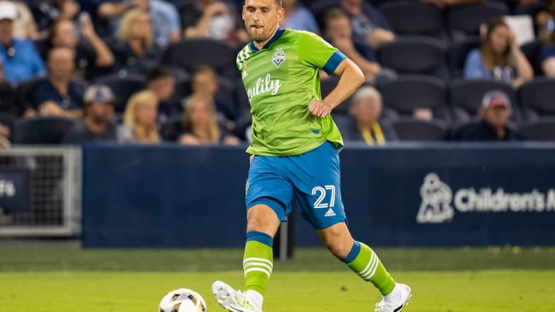 Sep 26, 2021; Kansas City, Kansas, USA; Seattle Sounders defender Shane O'Neill (27) passes the ball against Sporting Kansas City during the second half at Children's Mercy Park. Mandatory Credit: Jay Biggerstaff-USA TODAY Sports