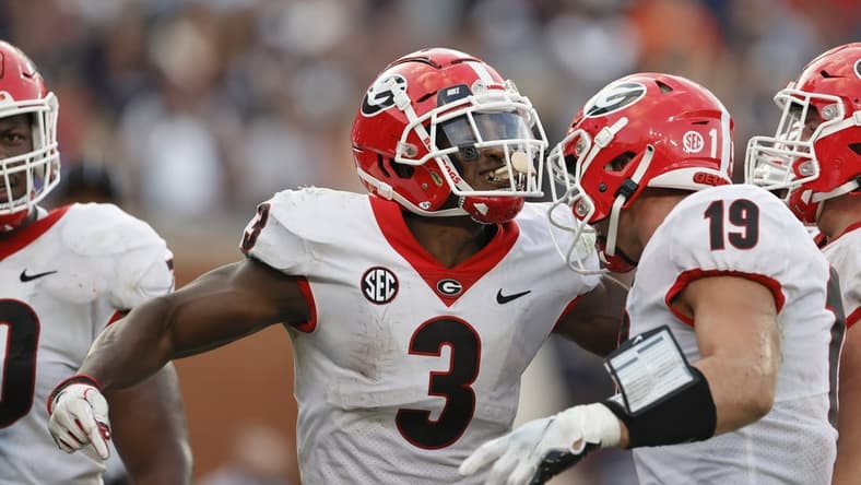 Oct 9, 2021; Auburn, Alabama, USA;  Georgia Bulldogs running back Zamir White (3) celebrates with Georgia Bulldogs tight end Brock Bowers (19) after scoring a touchdown against the Auburn Tigers during the fourth quarter Jordan-Hare Stadium. Mandatory Credit: John Reed-USA TODAY Sports