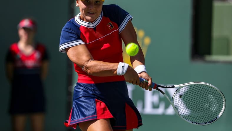 Bianca Andreescu of Canada returns the ball to Anett Kontaveit of Estonia during their round three match of the BNP Paribas Open, Monday, Oct. 11, 2021, in Indian Wells, Calif.
