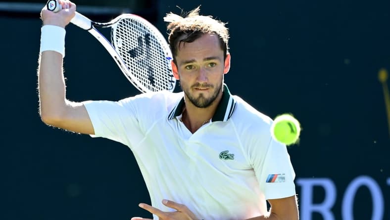 Oct 13, 2021; Indian Wells, CA, USA; Daniil Medvedev (RUS) hits a shot against Grigor Dimitrov (BUL) in his fourth round match during the BNP Paribas Open at the Indian Wells Tennis Garden. Mandatory Credit: Jayne Kamin-Oncea-USA TODAY Sports