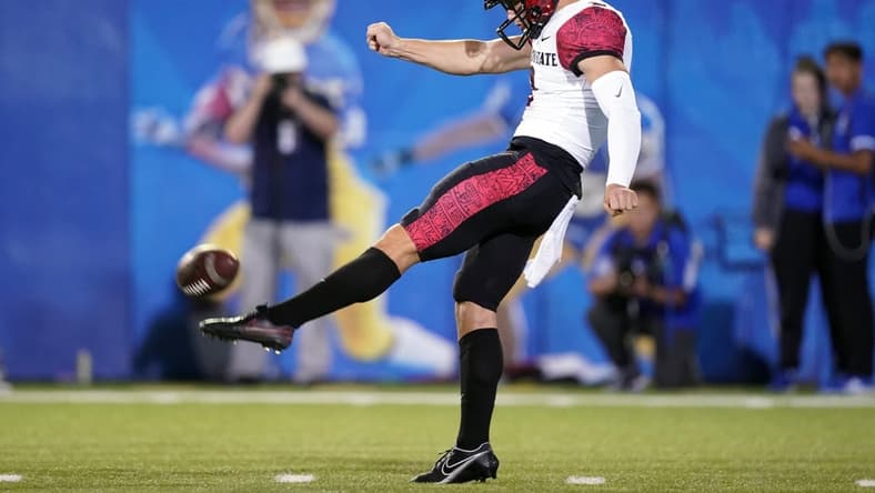 Oct 15, 2021; San Jose, California, USA; San Diego State Aztecs kicker Matt Araiza (2) punts during the fourth quarter against the San Jose State Spartans at CEFCU Stadium. Mandatory Credit: Darren Yamashita-USA TODAY Sports