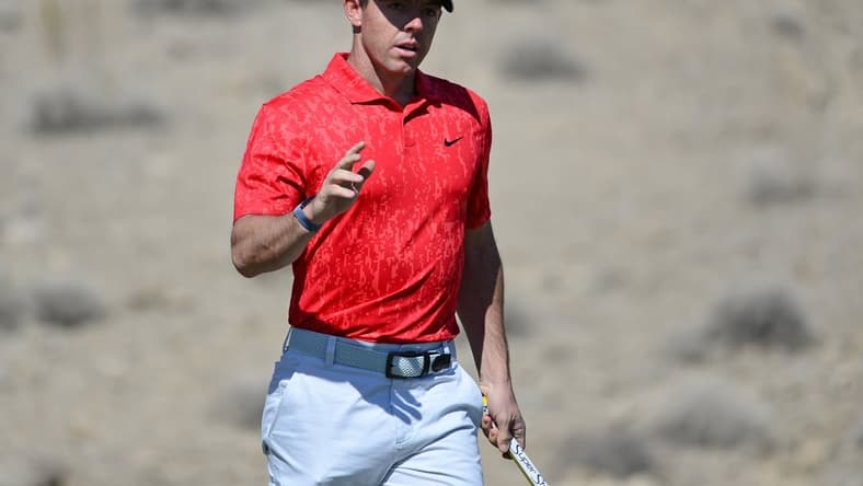 Oct 17, 2021; Las Vegas, Nevada, USA; Rory McIlroy waves to the crowd after making a putt on the second green during the final round of the CJ Cup golf tournament. Mandatory Credit: Joe Camporeale-USA TODAY Sports