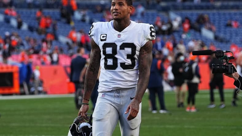 Oct 17, 2021; Denver, Colorado, USA; Las Vegas Raiders tight end Darren Waller (83) celebrates defeating the Denver Broncos at Empower Field at Mile High. Mandatory Credit: Ron Chenoy-USA TODAY Sports